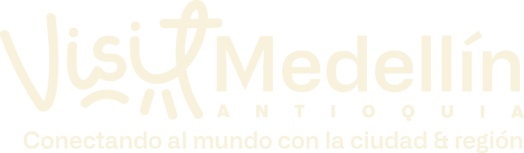 Logo Visit Medellín y Antioquia, conectando al mundo con la ciudad y región